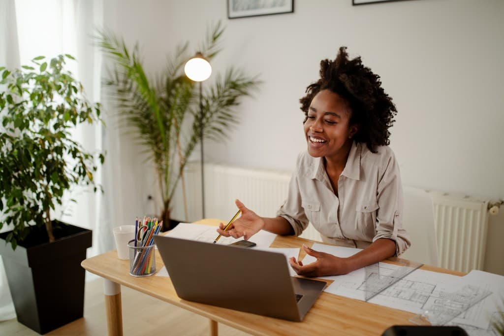 Professional on a video call from her home office
